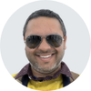 Portrait of Ketan Vijayvargiya, Principal Engineer at AWS, wearing sunglasses and smiling.